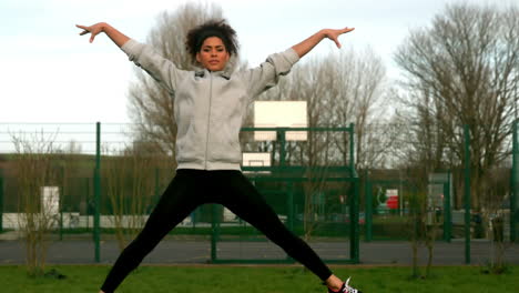 fit woman exercising outside