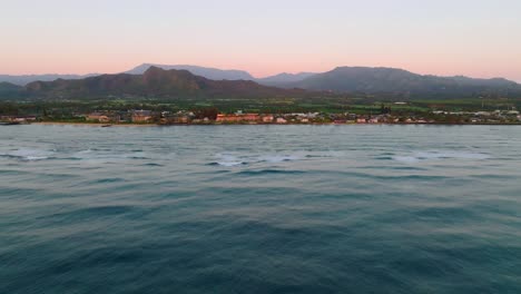 Drone-flight-from-Kauai-Coastline-to-the-interior-of-Hawaiian-island-at-sunset