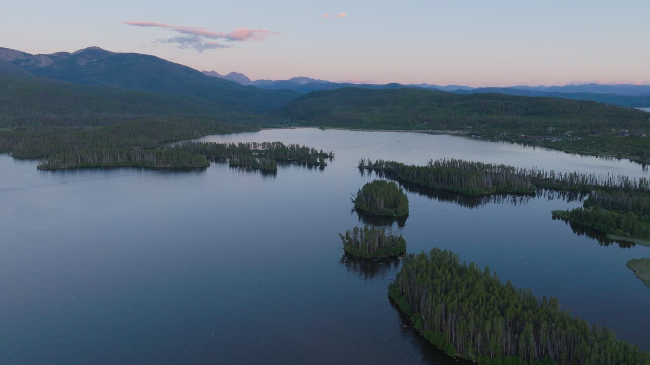 orbiting Drone shot of Shadow Mountain Lake at sunset in Colorado