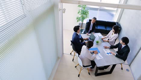 business persons working in an office