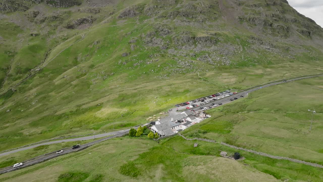 Summit Of The Kirkstone Pass With Ullswater Visible Through Steep Sided Valley. Summer. Lake District, Cumbria, UK