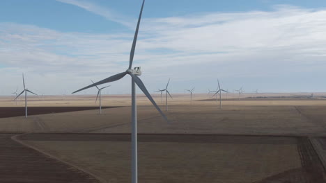 aerial tracking shot of massive wind farm in north texas, usa