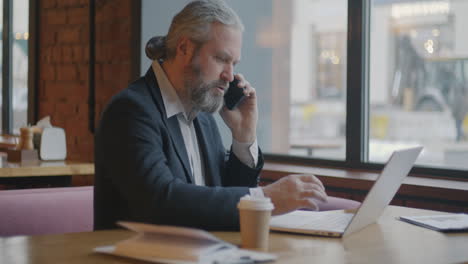 businessman working in a cafe