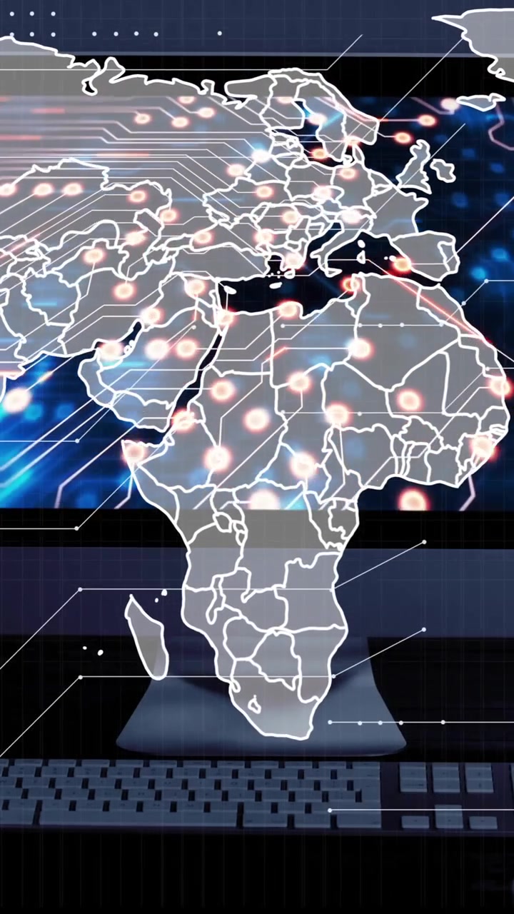 Animation of world map over computer screen with computer circuit board