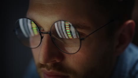 close up of man working on computer