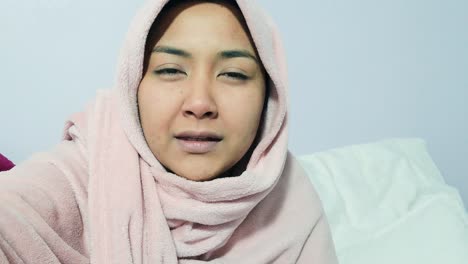 Female-Student-University-Student-Looking-Visibly-Unwell-Coughing-Whilst-Talking-to-Camera-On-Video-Call