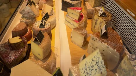 cheese displayed in the shop windows in france