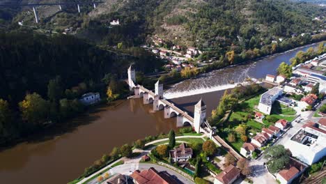 Aerial view of Pont Valentré bridge spanning Lot river in Cahors, France