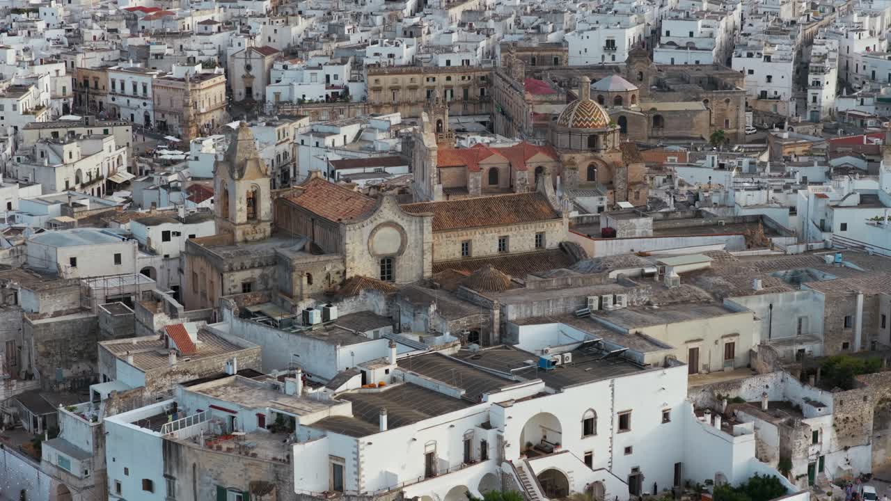Ostuni Cathedral, historic center, Puglia, Italy. Aerial drone approach