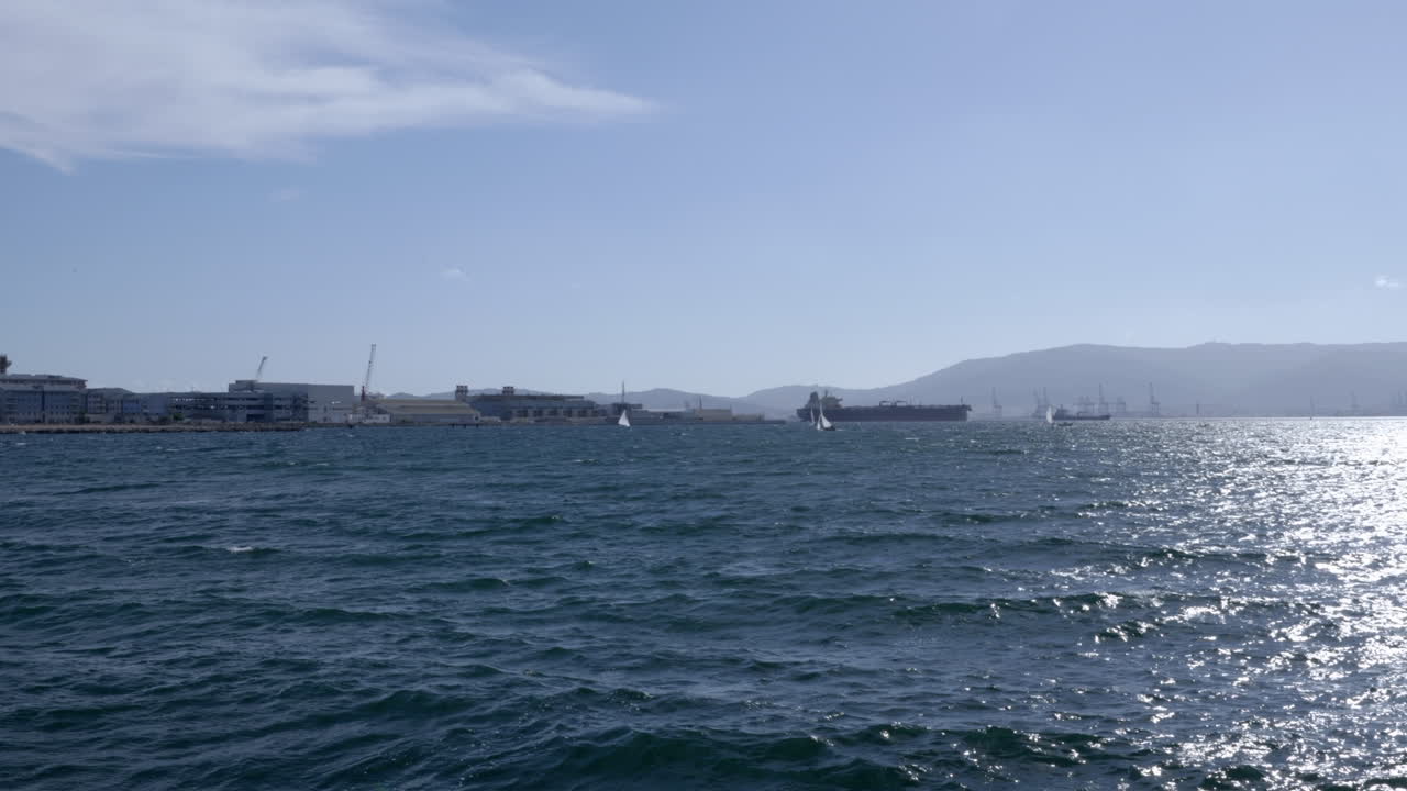 Pan from the rock of Gibraltar towards the Algeciras bay, as seen from La Linea de la Concepcion in Spain