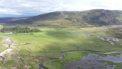 fields and forests of scotland from bird's eye view