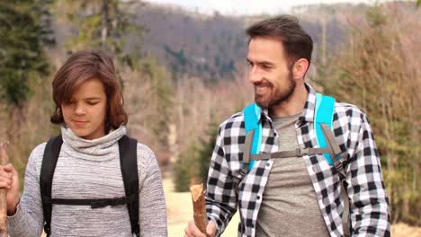 Happy-father-and-his-teenage-son-hiking-in-the-forest/Bielsko-Biala/Poland