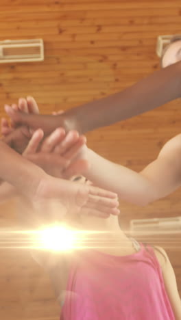 animación de puntos de luz sobre diversos escolares que se unen en el gimnasio