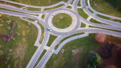 aerial view of early morning roundabout with scarce traffic during late autumn in lexington, kentucky