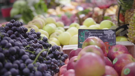 apples and grapes in a market montpellier france