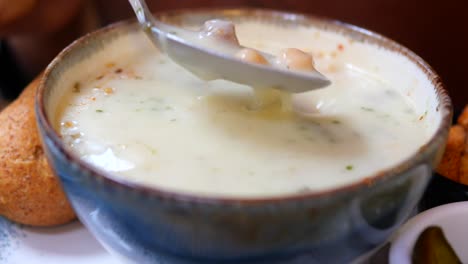 creamy mushroom soup with bread rolls