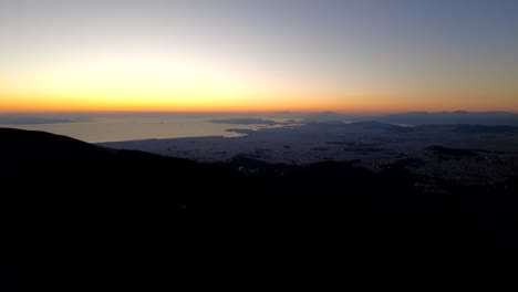 sunset timelapse over the city and sea