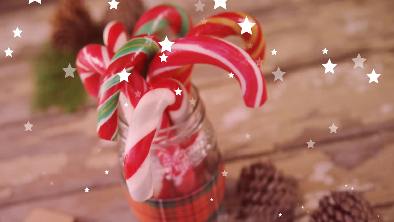 animación de estrellas sobre dulces de navidad