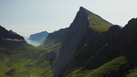 Cinematic-rising-drone-shot-of-cliffs-at-Horseid-Beach