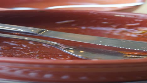 empty bowl with fork and knife