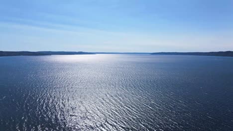 aerial drone shot over the blue sea of ​​the pacific northwest of washington