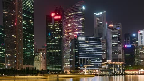 singapore, singapore, hyperlapse - the city skyline at night and its skyscrapers