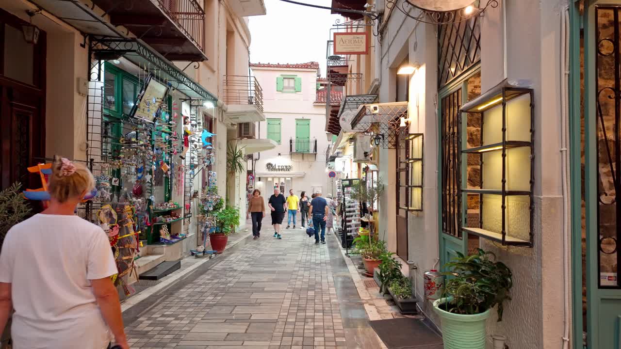 Narrow quaint Souvenir boutique paved shopping streets in Greek Mediterranean city
