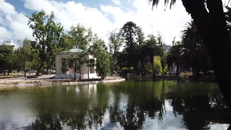 Slow-Fly-over-water-towards-classical-Gazebo