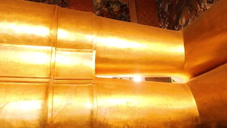 close-up views of the reclining buddha statue