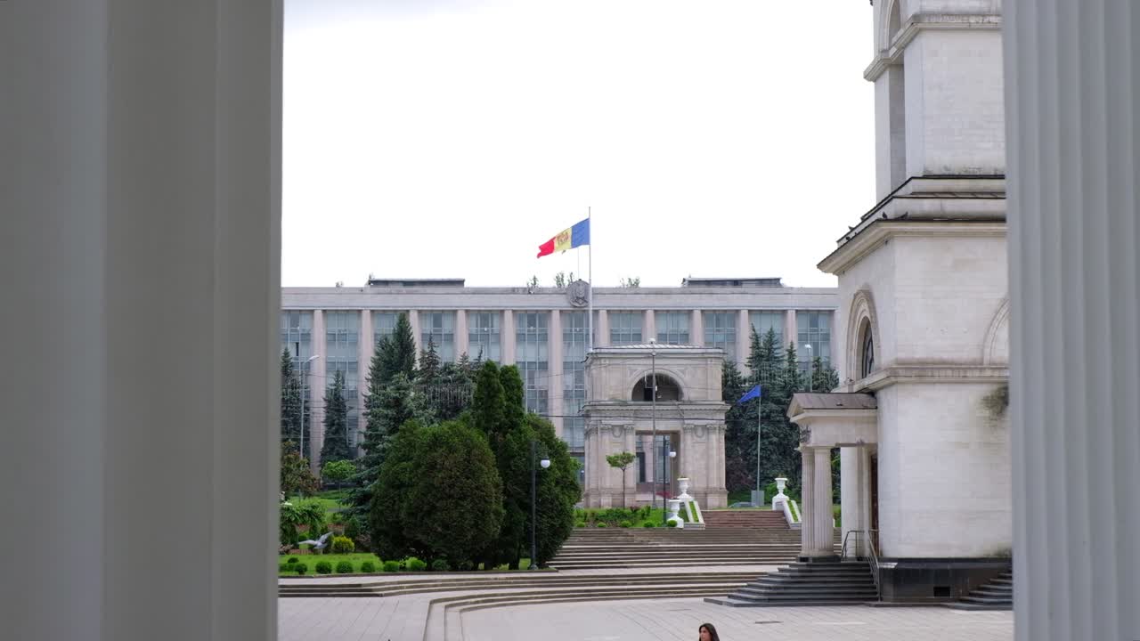 Chisinau, Moldova - May 27, 2021: People walking in the court of the Metropolitan Cathedral of Christ's Nativity