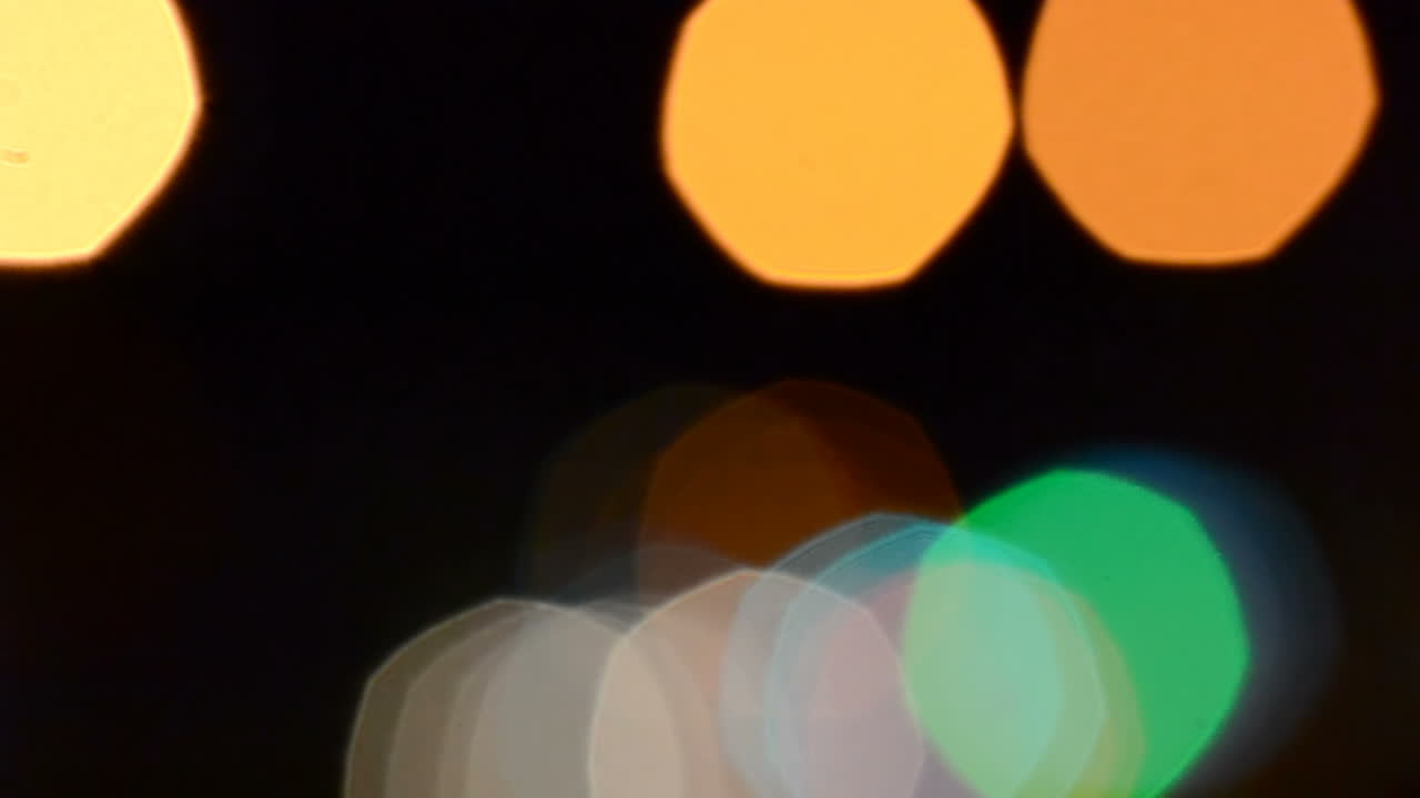 Light from headlights in the city. Night background from light