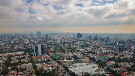hyperlapse: spectacular flight above downtown mexico city center buildings, wtc cruz azul soccer stadium, arena mexico bullring and benito juarez residential neighborhood, overhead aerial sideways