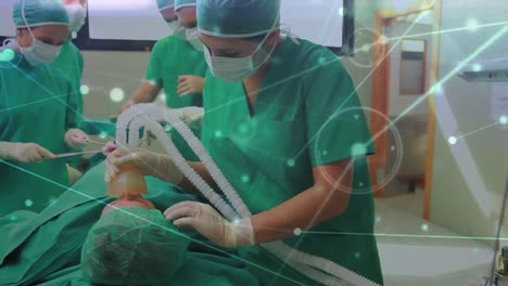 red de conexiones contra un grupo de cirujanos que realizan una operación en la sala de operaciones