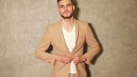 man in beige suit