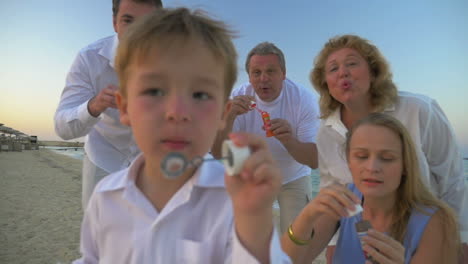 blowing soap bubbles together