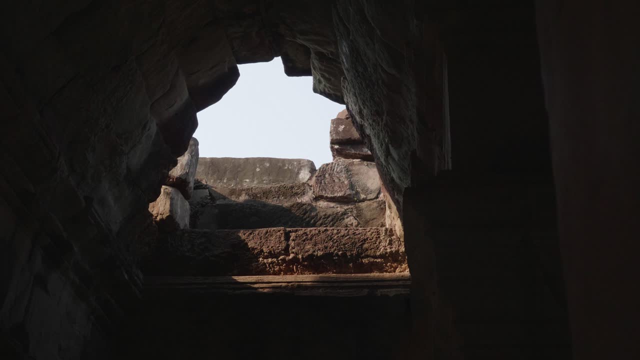 Reveal Of A Hole In The Roof Inside One Of The Buildings At The Temples Of Angkor. Trucking Left, 4K