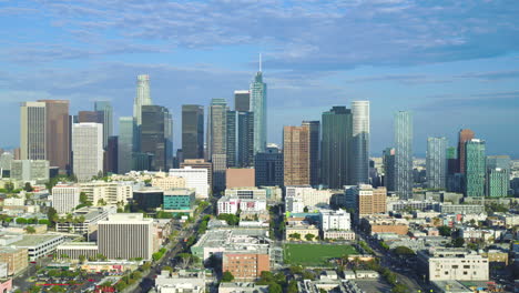 aerial orbiting shot showing the large skyscrapers in downtown los angeles