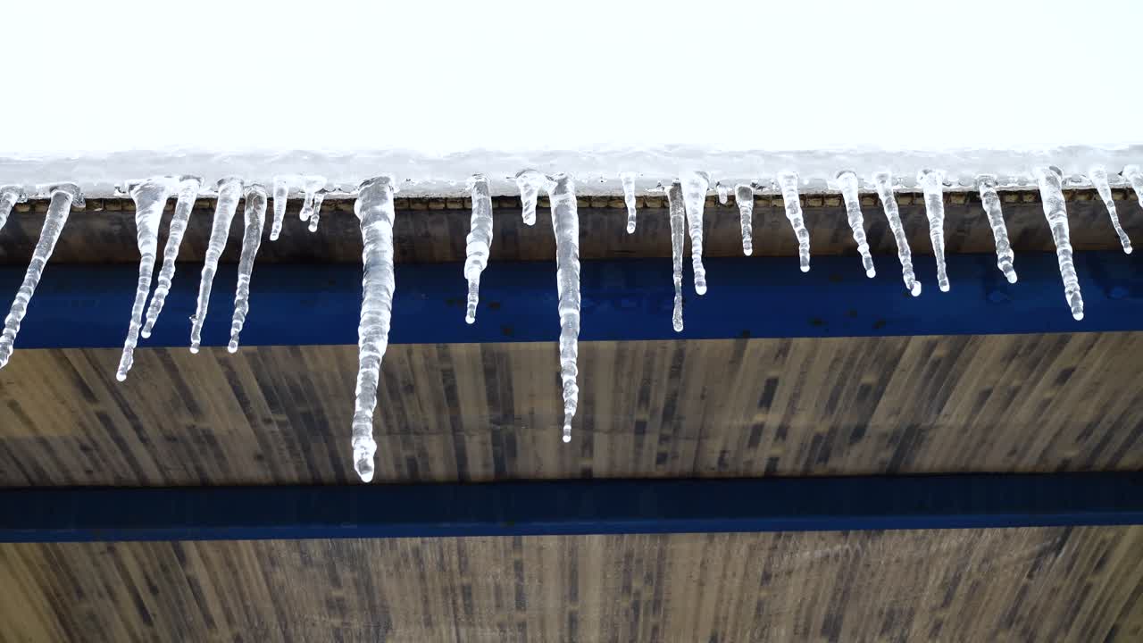 The thawing icicles. Shooting in the winter