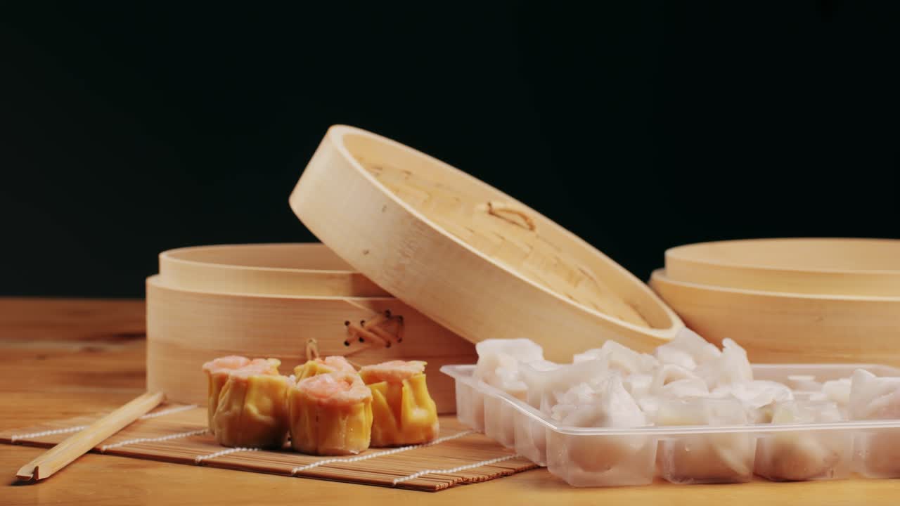 Various of frozen dim sum close-up macro. Food to take away. Chinese dessert food. Dimsum with shrimps, fish and meat. Dish in a cafe. Delivery