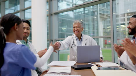 doctor, meeting handshake and applause of medical