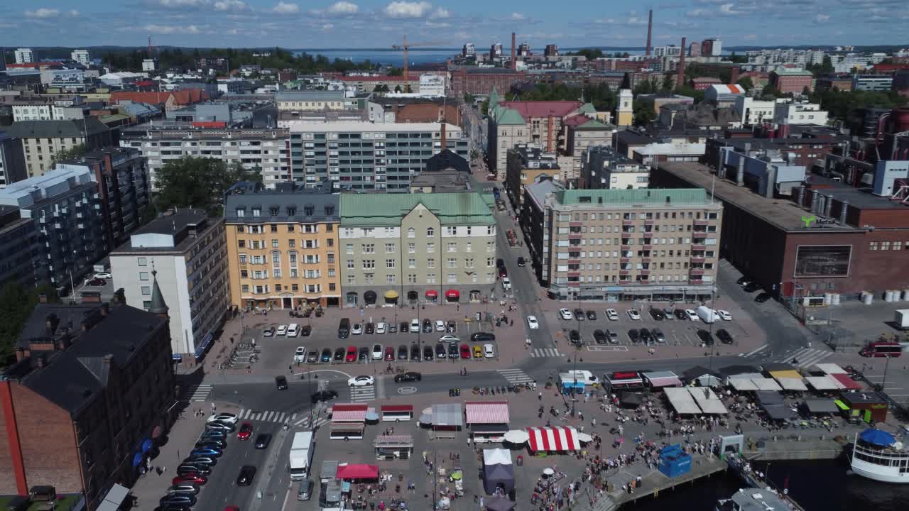 Sunny summer day flyover of Tampere Laukontori waterfront, Finland