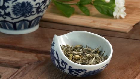 preparing a cup of jasmine white tea