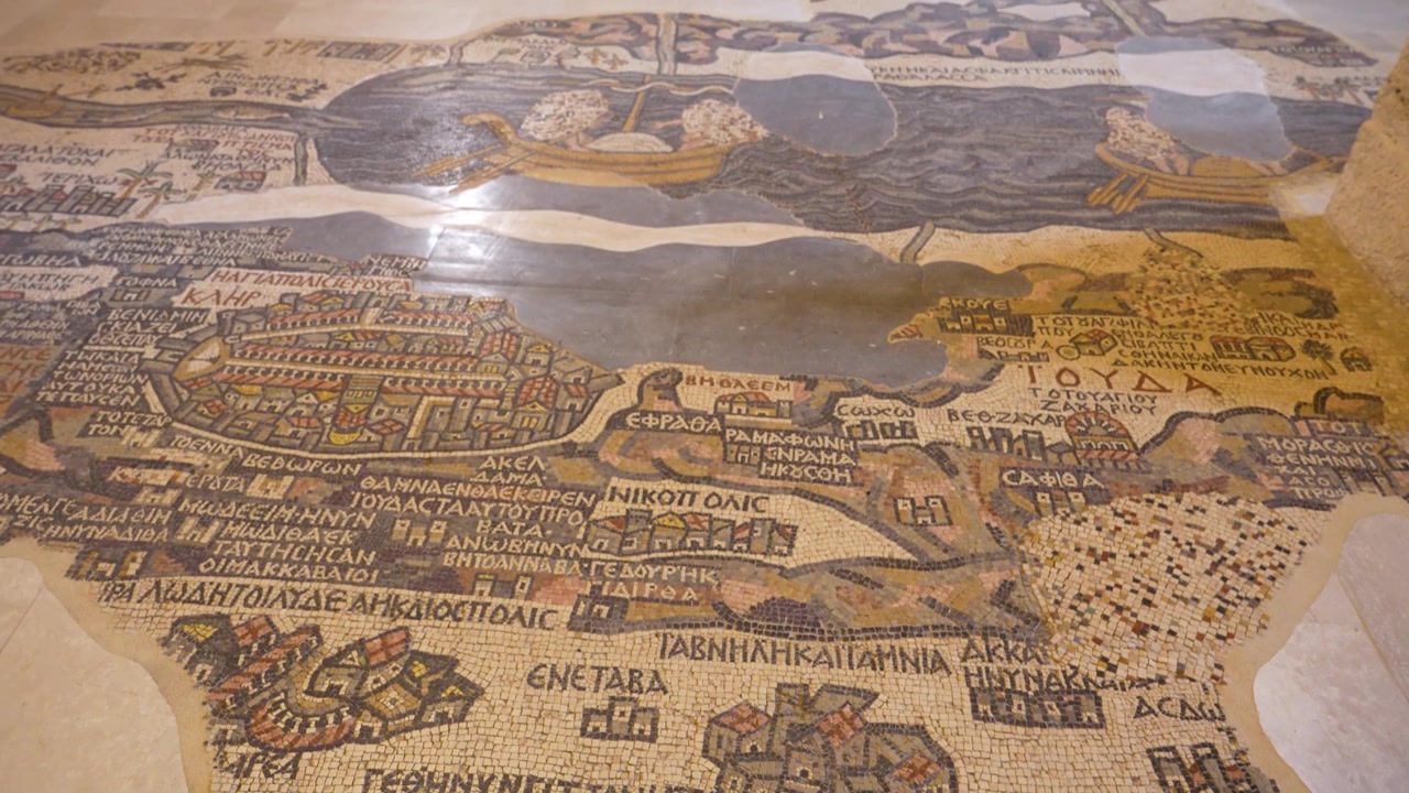 Madaba Mosaic Map of the Holy Land displays ancient place names inside Saint George Church, Jordan, overview of early artistic cartography