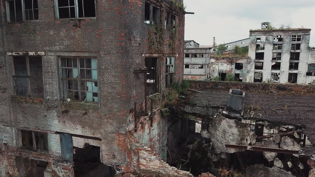 Ruins of an old factory. Old industrial building for demolition. Aerial view