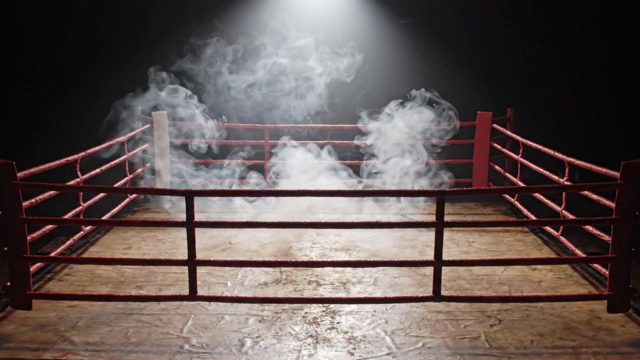 Un drammatico ring di pugilato ambientato su uno sfondo scarsamente illuminato, con volute di fumo che creano un'atmosfera intensa per l'attesa del match.
