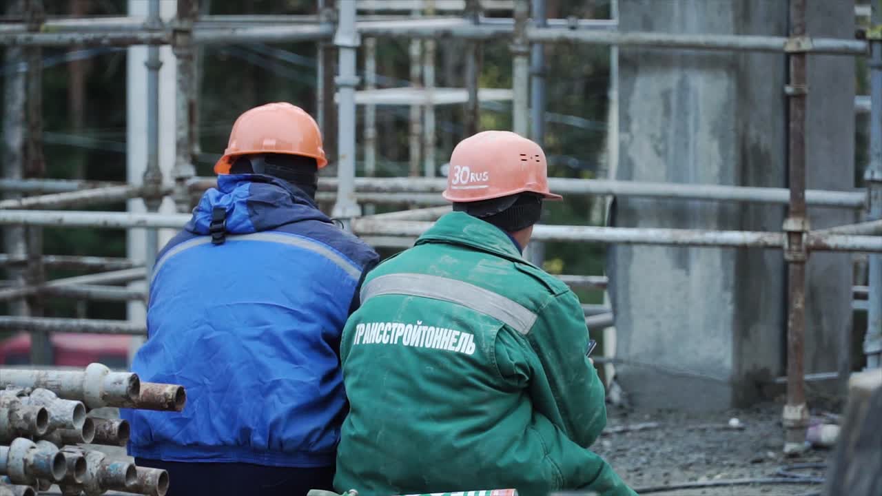 Construction workers on a building site