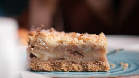 a slice of apple crumble pie