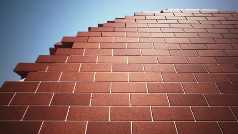 Animation-presenting-the-brick-technology-building-wall.-One-brick-on-another-filled-and-connected-with-the-white-grey-concrete-at-the-perfectly-clear-blue-sky-environment.-Left-to-the-right.-HD