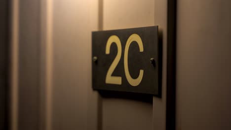 2c house number on townhouse at night