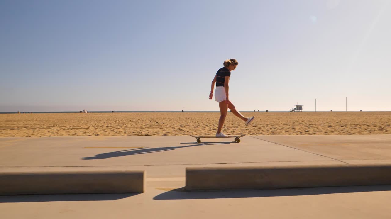 Attractive Girl Riding Longboard In Sunny Weather - wide, slow motion